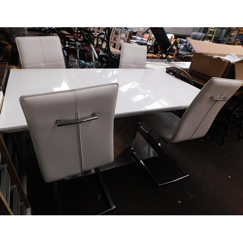 667 - Contemporary extending glass finish table and 4 white chairs - approx. 36