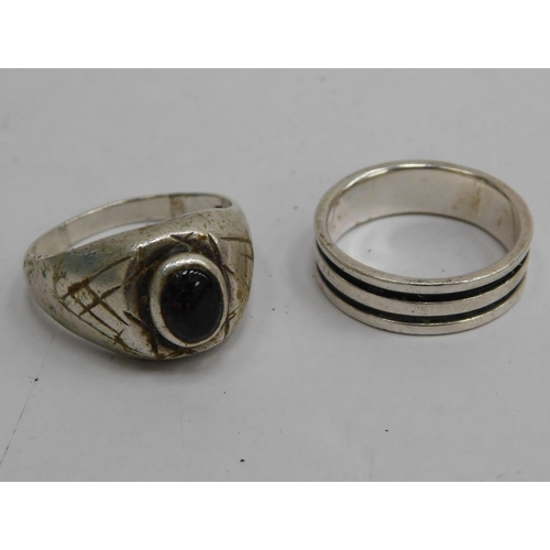 129 - Two - large gents silver rings