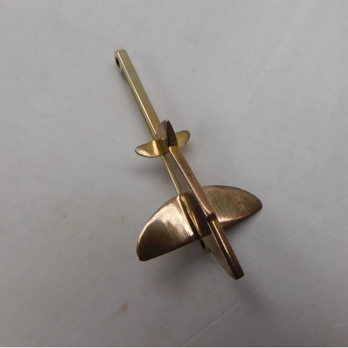 140 - 9ct gold - bar brooch with Spitfire detail