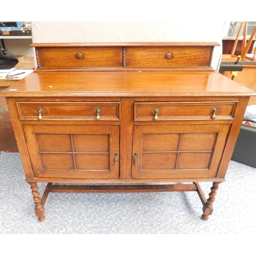 552 - Oak sideboard with brass handles