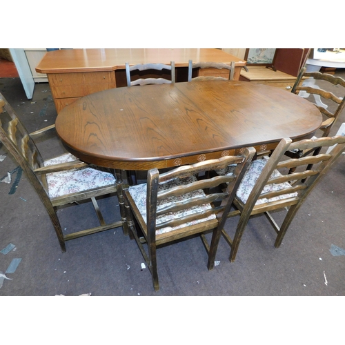 753 - Oval oak extending dining table and 6 chairs