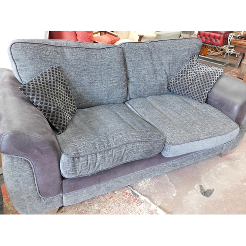 554 - Two seater sofa & 2 seater sofa bed in grey