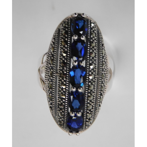 105 - Silver - blue stone & marcasite ring