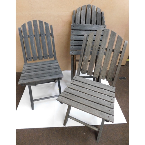 560 - Four wooden slatted folding chairs