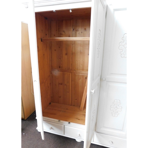 638 - Large painted pine triple wardrobe with drawer section