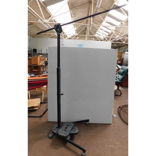 586 - Overhead light boom stand with counter balance weights - folds down