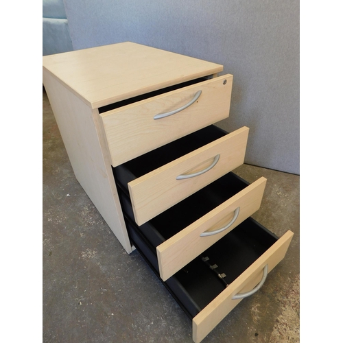 736 - 4 Drawer office desk on castors