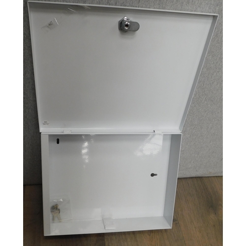 523 - Wall mountable lockable metal cabinet with key