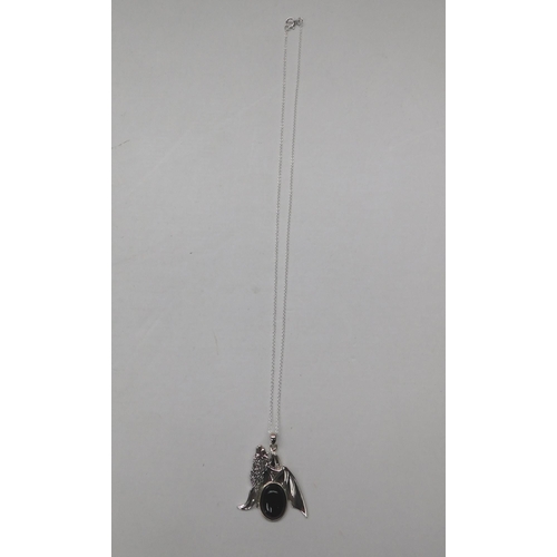 124 - Silver & jet - bat pendant on silver chain