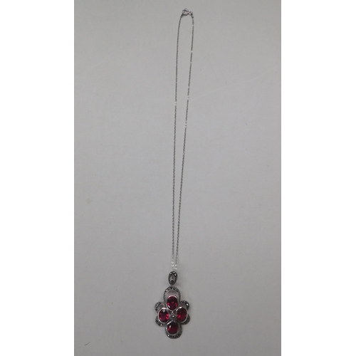 147 - Silver - red stone & marcasite set pendant - on silver chain