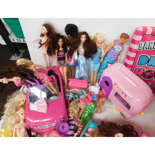 603 - Large box of Barbies and accessories incl. fold away 'Barbie Dream House' car, camper van etc. - app... 