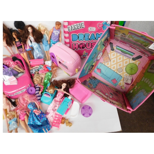 603 - Large box of Barbies and accessories incl. fold away 'Barbie Dream House' car, camper van etc. - app... 