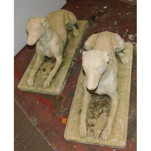 663 - Pair of large garden stoneware dogs on plinths (app 29