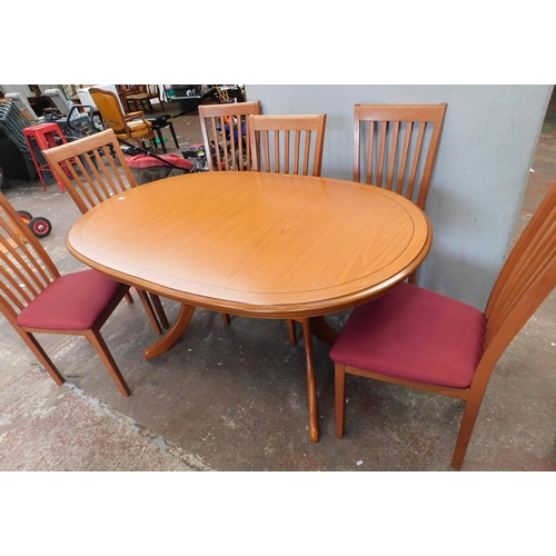 764 - Marcoan extending dining table and 6 chairs