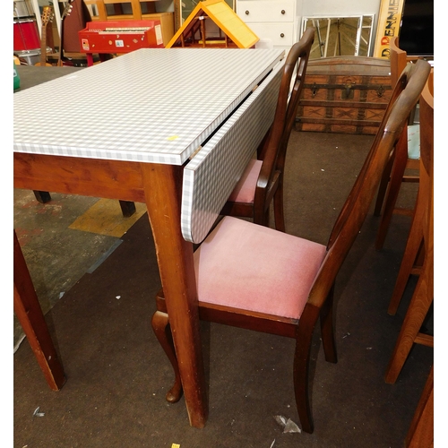 770 - Formica single sided drop leaf table and two dining chairs