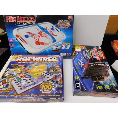 47 - Three - boxed toys/games - including Hot wires electronics