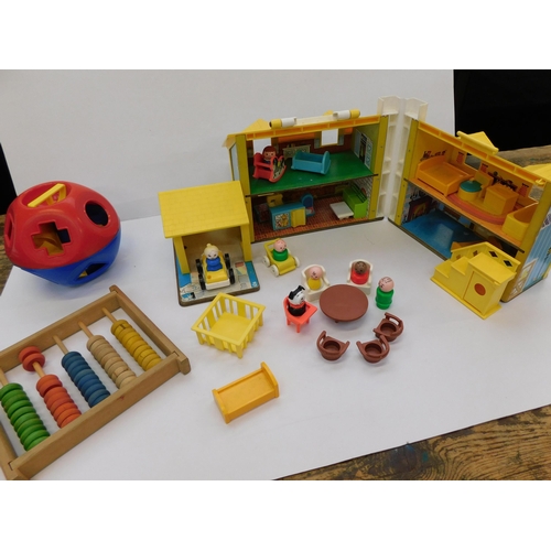 52 - 1970's era toys including - Fisher Price house/ accessories/abacus & shape sorter