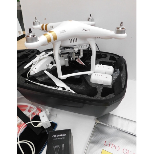 611 - DJI Phantom 3 Pro quad-copter W/O - needs new battery, with accessories and Nexus iPad plus DJI carr... 