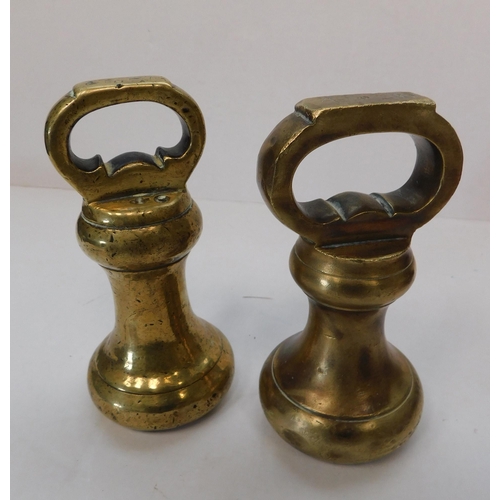 17 - Two - brass/bell weights