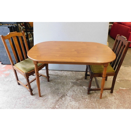 549 - Vintage oval dining table and two chairs