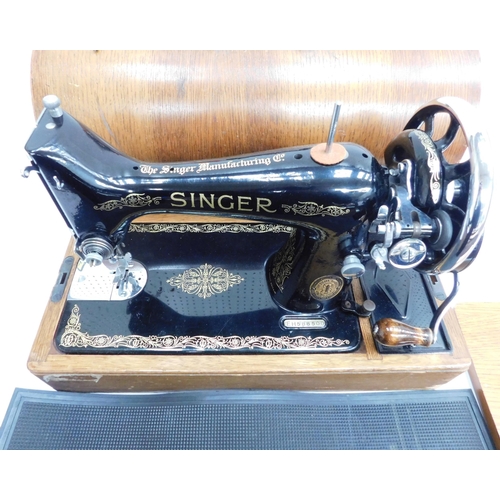 584 - Vintage cased Singer sewing machine and mat W/O