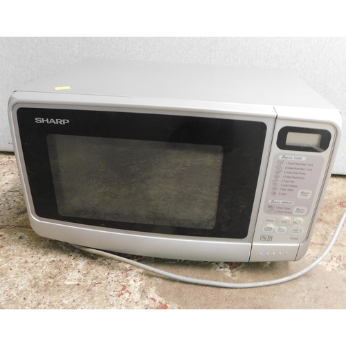 613 - Sharp 800W microwave W/O