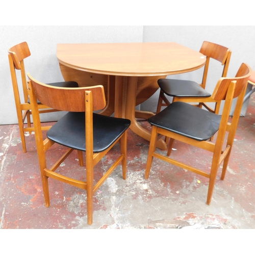 631A - Mid Century teak drop leaf table and four chairs