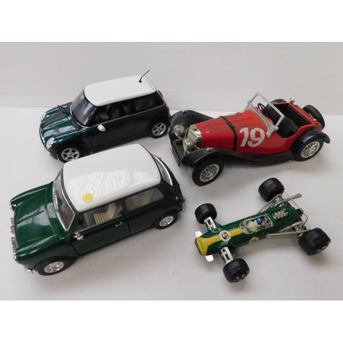 71 - Four/die cast model cars including - Mini Cooper & F1 Lotus