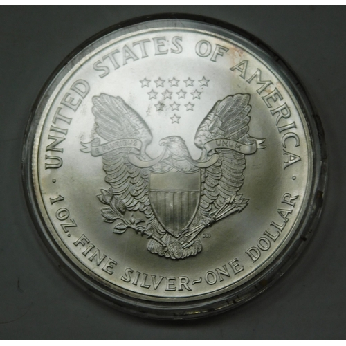 101 - 1oz of fine silver - 1999 Dollar coin