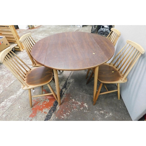 558 - Mid-century Dinette drop leaf table and four dining chairs...