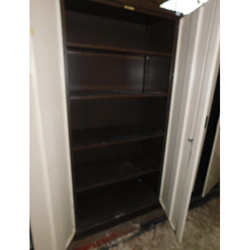 710 - Large metal two door storage cabinet with shelves incl. keys