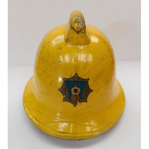 72 - 1980s fireman's helmet - size/medium