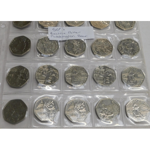 135 - Twenty five/Fifty pence coins - including Beatrix Potter & Paddington Bear