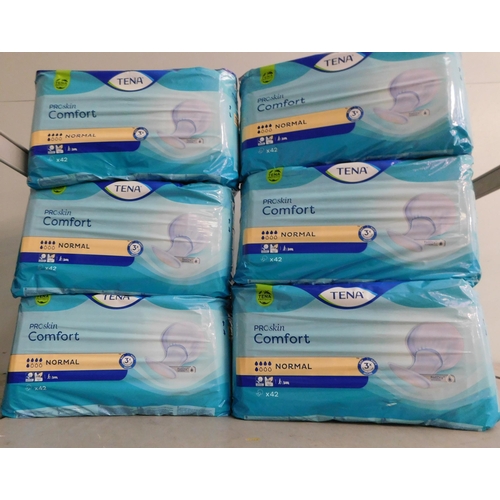 699 - Six packs of new/sealed Tena pads