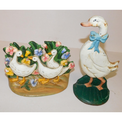 724 - Two cast Geese doorstops