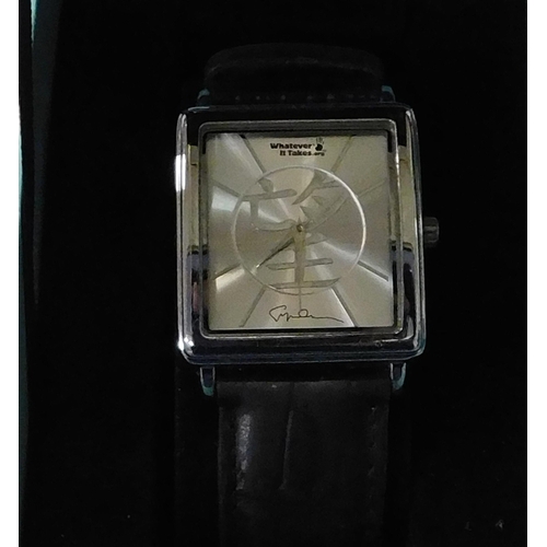 209 - Whatever it takes/Giorgio Armani - wrist watch & paperwork - as new