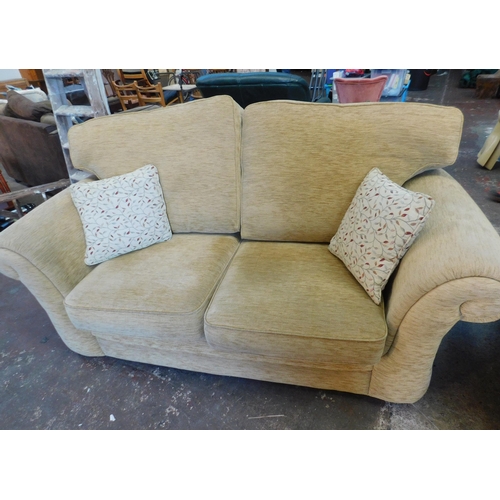 563 - Large two seater sofa, arm chair and pouffe