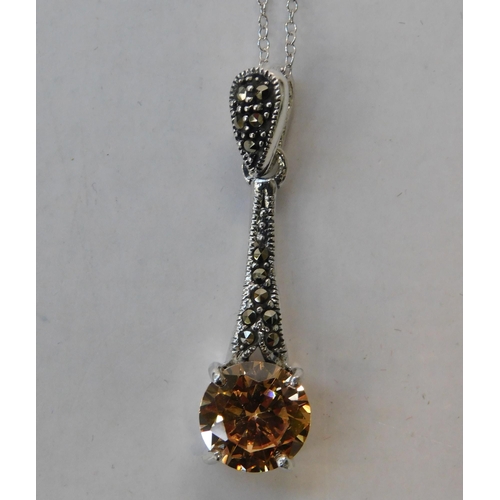 233 - Silver - citrine & marcasite pendant on silver chain