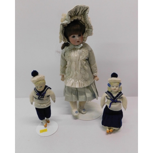 234 - Doll & antique sailors