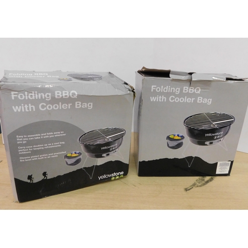 507 - Two folding barbeques with cooler-bag