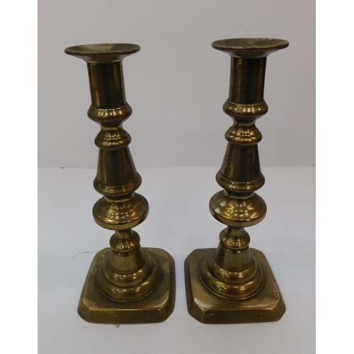 64 - Brass candlesticks