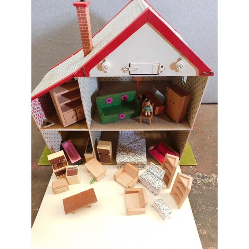 658 - Dolls house and contents/furniture