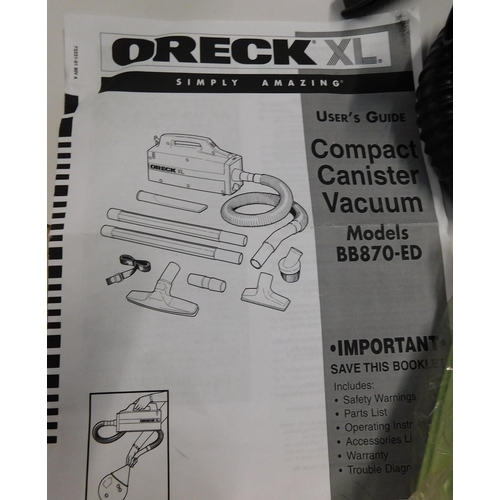 682 - Oreck XL vacuum cleaner and accessories - unchecked