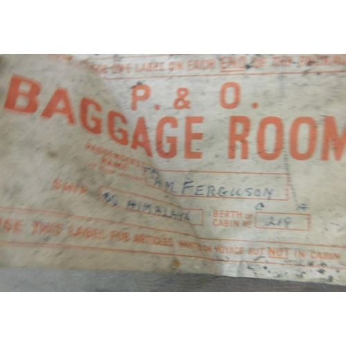 735A - Four vintage suitcases