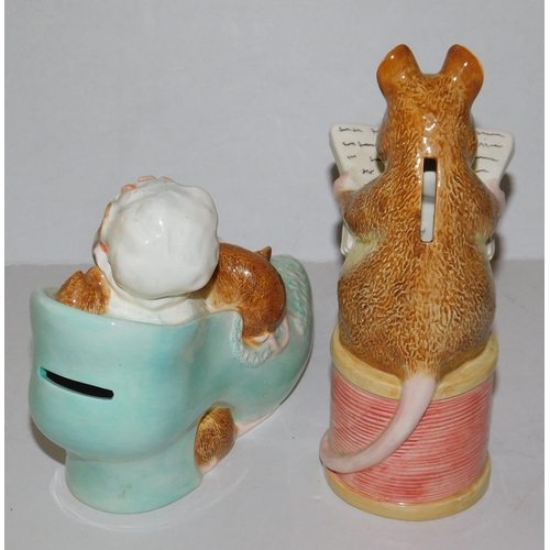 123 - Two Beatrix Potter money boxes with stoppers by Enesco