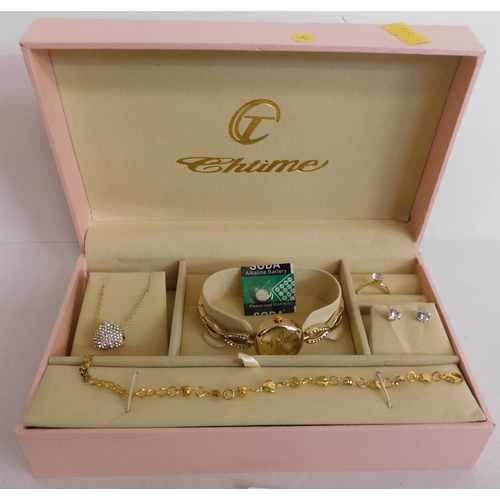 29 - Chitime, watch, bracelet, pendant with chain, ring and earrings