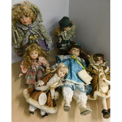 20 - Six - porcelain dolls/two on stands