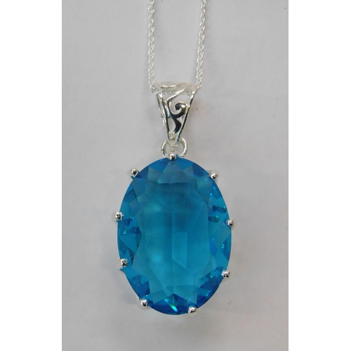 311 - Silver & blue topaz - pendant on silver chain