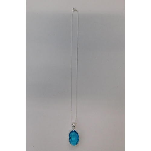 311 - Silver & blue topaz - pendant on silver chain