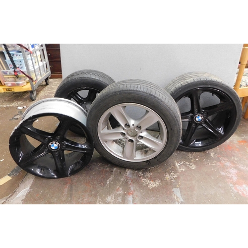 507 - Four BMW alloy wheels - mixed sizes